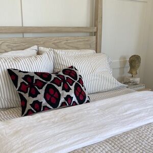 Elegant Black and Red Patterned Throw Pillow